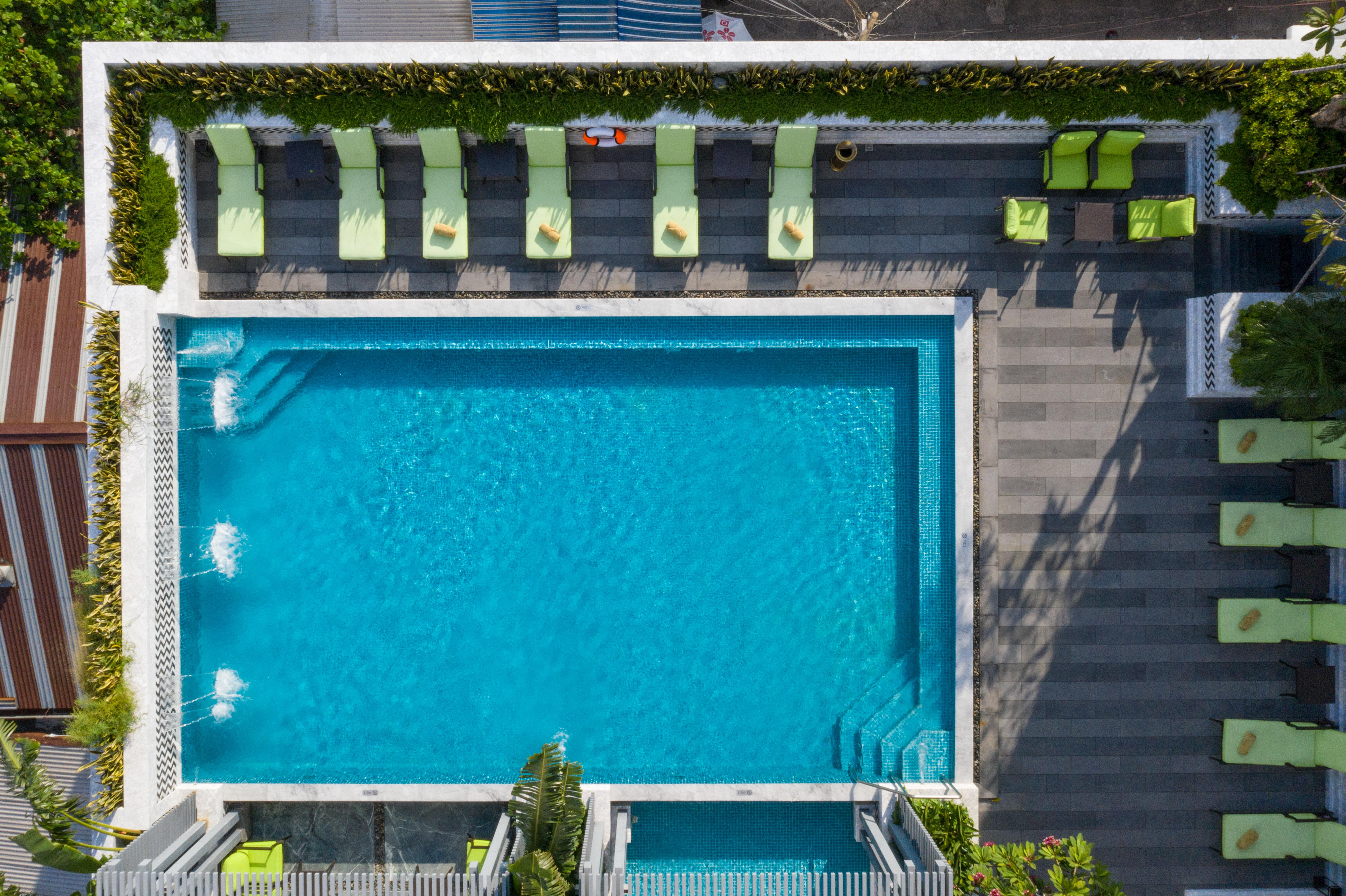 Mai House Saigon Hotel Хошимін Екстер'єр фото Aerial view of the rooftop pool at the hotel